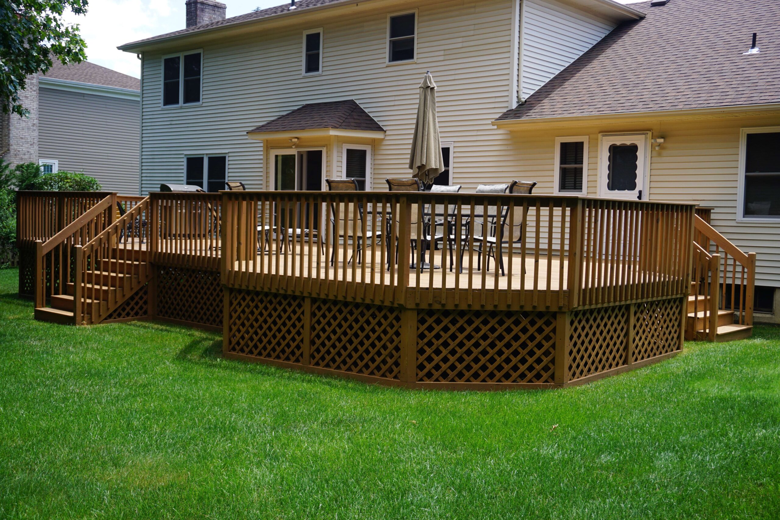Pressure Treated Deck with Wood Lattice Skirting and Wood Railing
