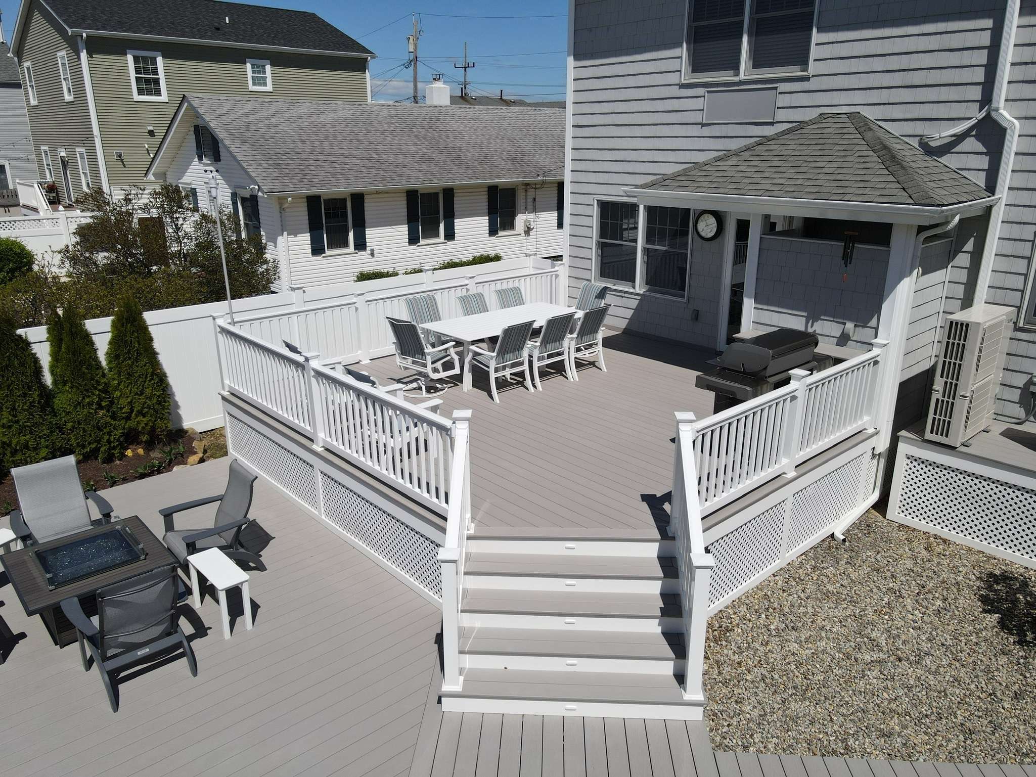 Wolf Harbor Gray Deck with vinyl trail and Lattice Skirting